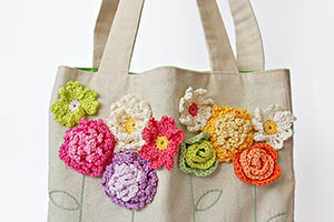 Tote bag with crochet flowers