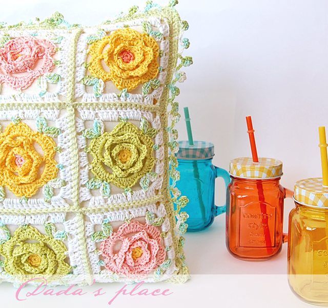 Colorful flowery crochet pillow