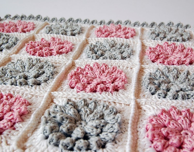 Pink and gray flowery crochet pillow case